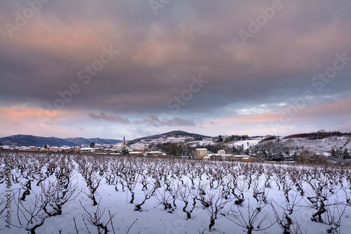 Village of Denice and landscape of Beaujolais under the snow