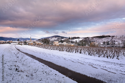 Village of Denice and landscape of Beaujolais under the snow