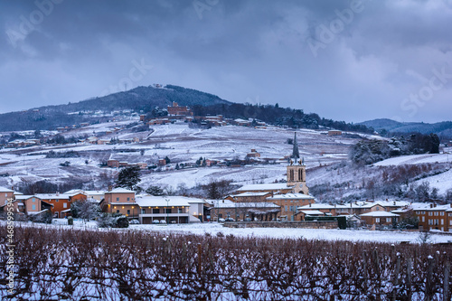 Village of Denice and landscape of Beaujolais under the snow