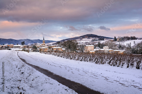 Village of Denice and landscape of Beaujolais under the snow