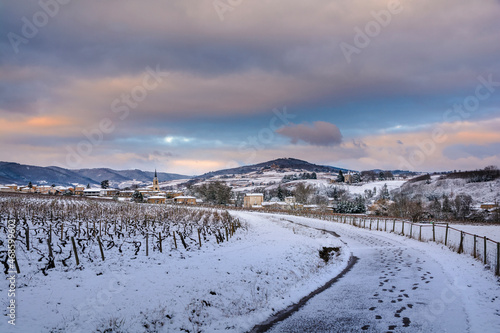 Village of Denice and landscape of Beaujolais under the snow