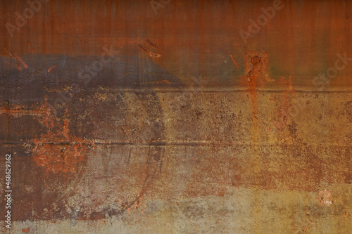 Texture of an orange brown rusty background with circles