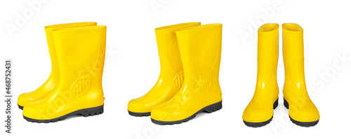 Yellow rubber boots isolated on white background