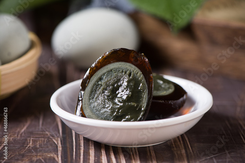 preserved duck eggs or Century egg on wood background