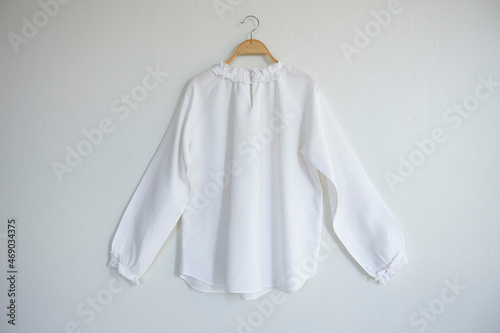 White blouse linen on white background.