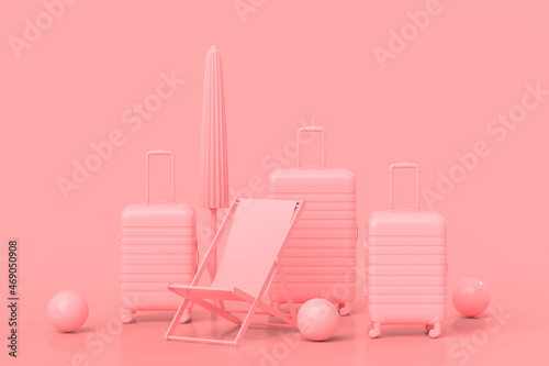 Suitcase with beach ball, umbrella and chair on monochrome pink background