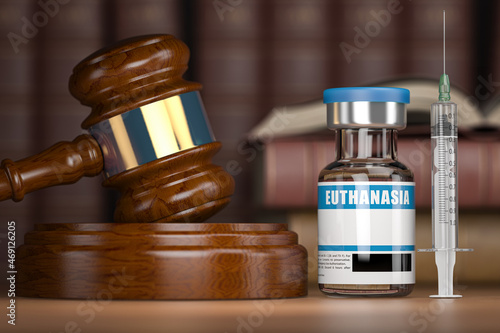 Euthanasia concept. Gavel as a symbol of legal system vith vial and syringe.