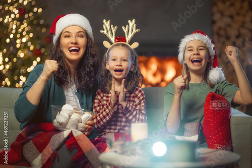 family watching holiday movies at home