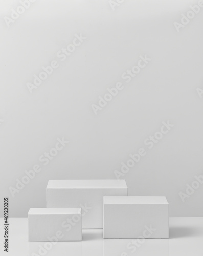 White blank empty podium isolated on gray background