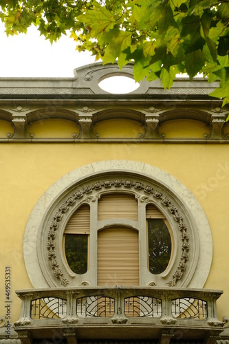 Circular window. Circular window of a secessionist house.Quaroni house in Novara inspired by the principles of the Viennese secession. 