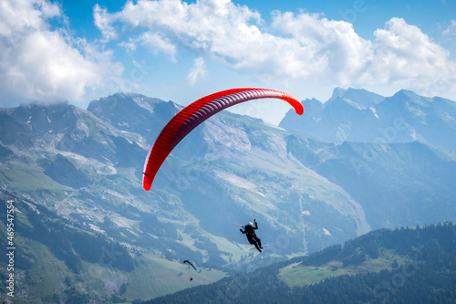 paragliding flight in the mountains. Le Grand-Bornand, France