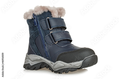 Winter boots insulated fur, waterproof children's shoes, winter clothing isolated on a white background, close-up