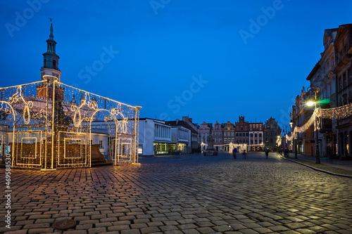 The Market Square with historic tenement houses, tower of town hall and christmas decorations