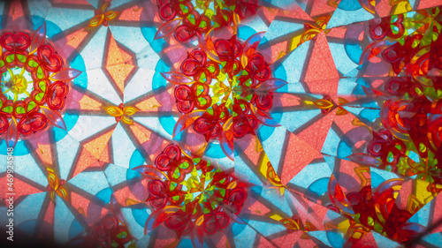 A pattern of multicolored glasses in a children's kaleidoscope