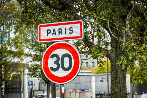 Paris entrance traffic sign with a speed limit for cars of 30 kilometers per hour