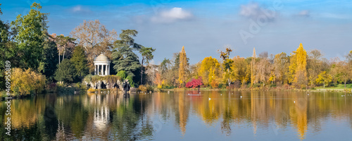 Vincennes, the temple of love and artificial grotto on the Daumesnil lake, in the public park, in autumn 