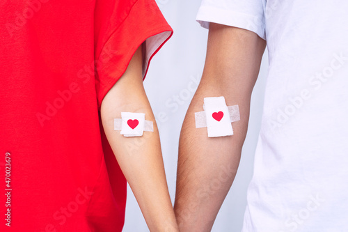 Blood donation. Blood donors with bandage after giving blood