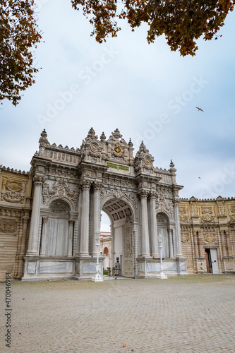 Dolmabache palace main entrance gate in Istanbul, Turkey. Dolmabache served as the main administrative center of the Ottoman Empire and is popular for tourists and visitors.