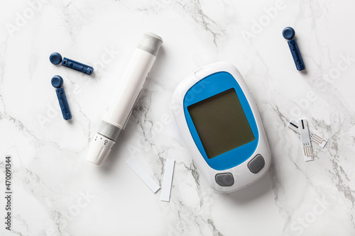 glucometer ketometer lancet and strips for self-monitoring of blood glucose or ketones level. diabetes or keto diet