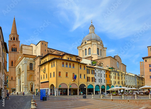 Piazza delle Erbe in Mantua downtown with the Basilica and Cathedral of Sant'Andrea - Mantua, Lombardy, Italy. Mantova is UNESCO World Heritage Site Lombardy, Italy, Europe.