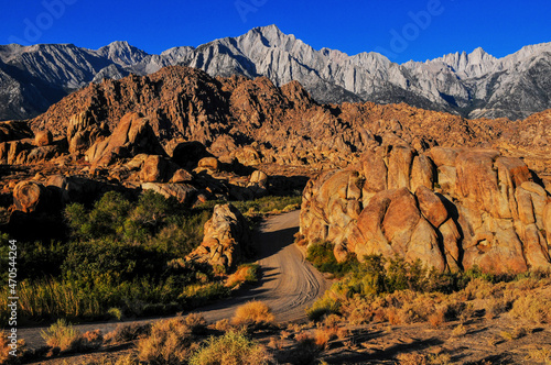 Early morning light on Mount Langley, Lone Pine Peak, Mount Whitney and the rock formations of the Alabama Hills National Scenic Area, Lone Pine, Eastern Sierra, California, USA