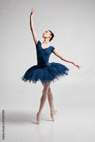 Beautiful ballerina posing in studio.