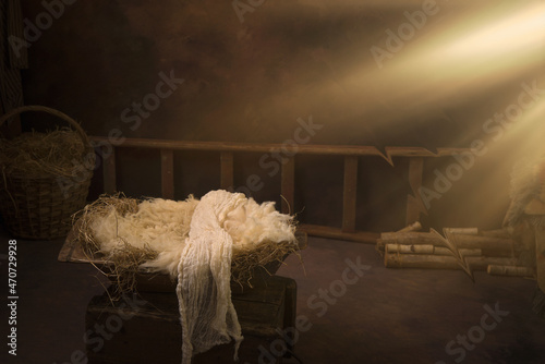 Empty crib in nativity manger