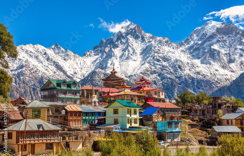 Scenic Himachal village at Kalpa with majestic Kinnaur Kailash Himalaya mountain range at Himachal Pradesh India