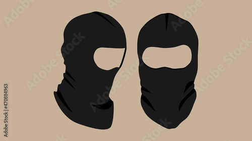 Black balaclava or bandit mask. Vector image of a black mask with slits for the eyes.