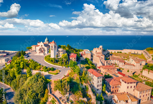 Bright summer view from flying drone of Cattedrale di San Ciriaco church and San Gregorio Illuminatore - Catholic church. Stunning morning cityscape of Ancona town, Italy, Europe.