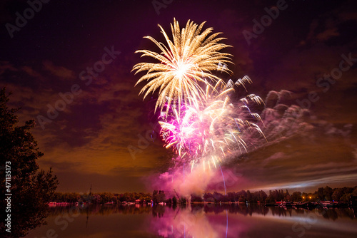 Fireworks display over the lake in L'Isle-Jourdain, France