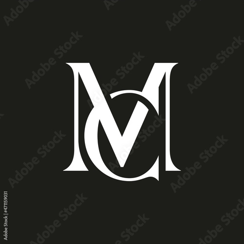 M and C logo on black background