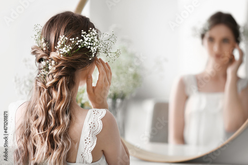 Beautiful young bride preparing for her wedding day