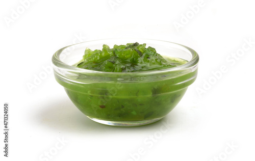 bowl with relish sauce on white background