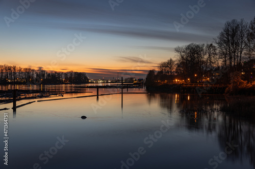 Fraser River on a calm evening at sunset or dusk - Vancouver, BC Canada