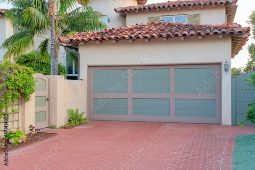 Garage exterior with red bricks driveway at La Jolla, California