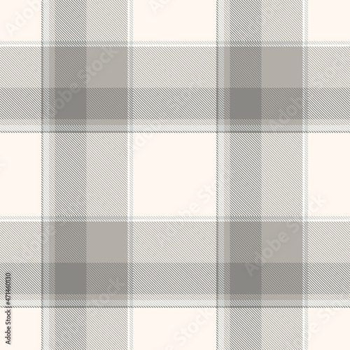 Seamless plaid pattern in pastel beige, gray and taupe. All over classic fabric print. 
