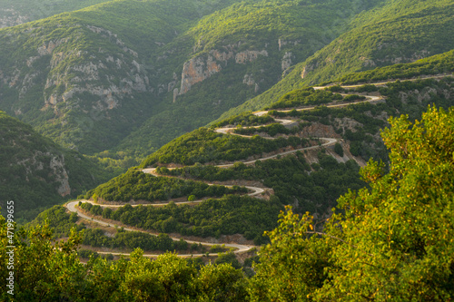 Winding road near Voidomatis River Vikos Gorge National Park, northern area of mainland Greece 