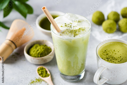 Delicious Vegan Matcha Ice Latte In Glass On Grey Stone Background Closeup View