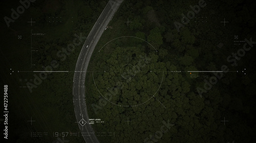 Aerial view of unmanned Aerial Vehicle UAV or reconnaissance drone monitoring highway traffic tracking and targeting suspect moving vehicle