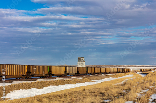 Rail cars and old granary near Choteau, Montana, USA