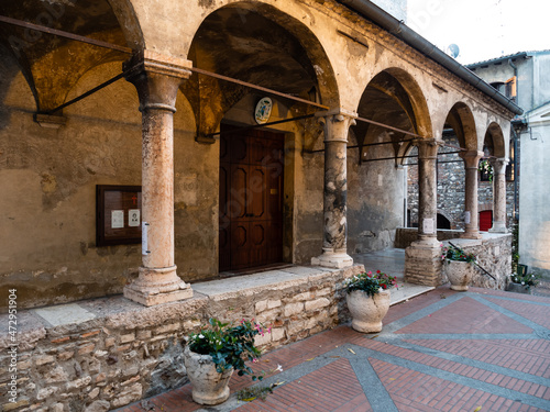 Santa Maria della Neve or Santa Maria Maggiore Church Entrance in Sirmione, Italy with Portico or Arcade