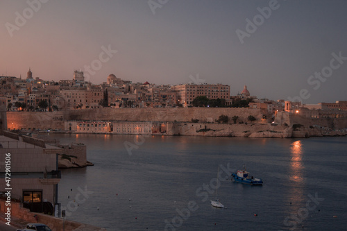 Sunset in small town on island in Malta