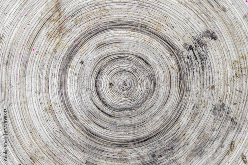closeup of a spiral shaped texture on a wooden panel - Old wooden board background