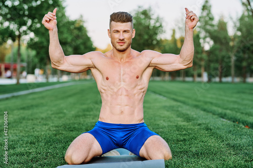 male athlete muscle exercise workout in the park
