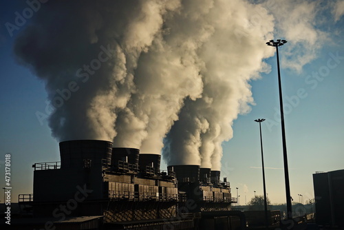 Factory chimneys with smoke emission. Industrial factory pollution, smokestack exhaust gases. factory chimney