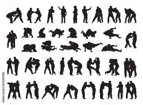 Collection of black silhouettes of people practicing judo. Shadows of the fighting men on a white background. Martial arts illustrations.