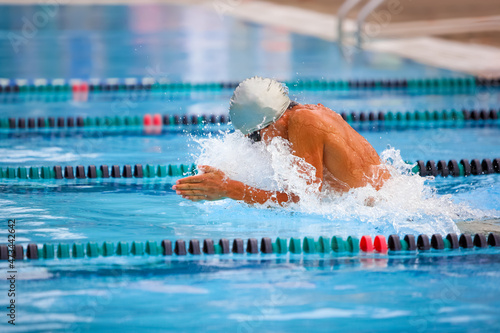 Breaststroke swimmer in a race