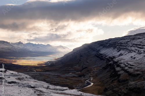 sensational view of the Icelandic Highlands in spectular lighting of the deep hanging clouds