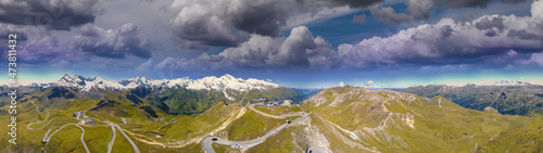 Panoramic aerial view of Grossglockner alpin peaks at summer sunset from drone, Austria.